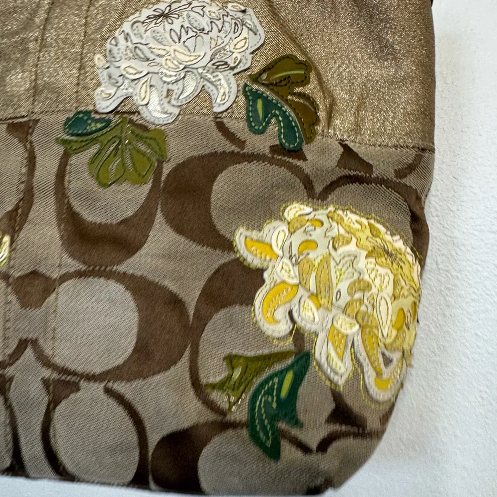Coach chrysanthemum appliqué